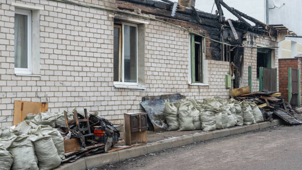 Professional Fire Damage Removal technician working in Dalbo, MN